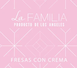 La Familia Fresas con Crema chocolate bar wrapper, soft pink with white geometric linework.